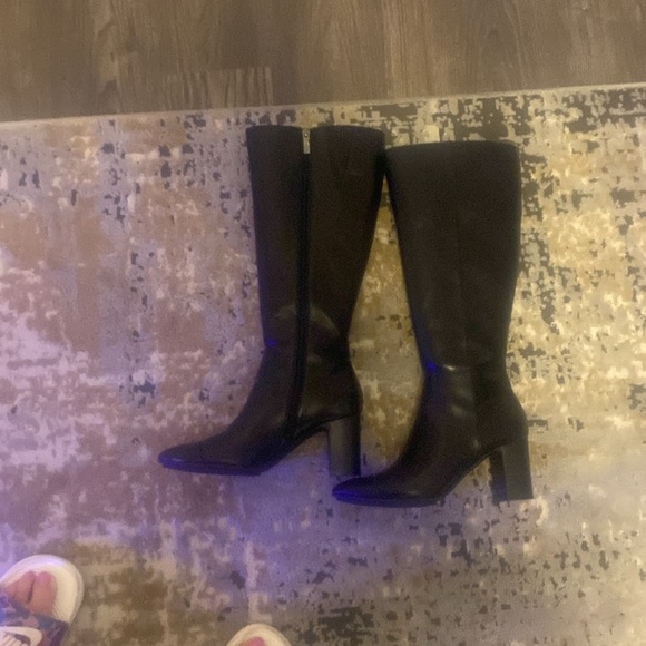 Brand new black boots. Perfect amt of heel. Very comfortable to walk in. - Picture 4 of 4